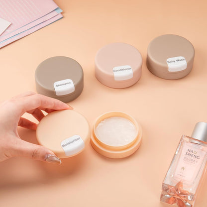 Gemice Travel Containers for Toiletries, Magnetic Travel Containers, TSA Approved Cream Jars with Toiletry Bag, Leak-proof Small 1oz Capsules Set with Multiple Labels for Organization (4 Pack)