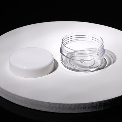 Refillable Cosmetic Sample Jars - 100 Pack 10g (0.35oz) White Small Travel Containers with Lids + 10 Mini Makeup Spatulas - BPA Free