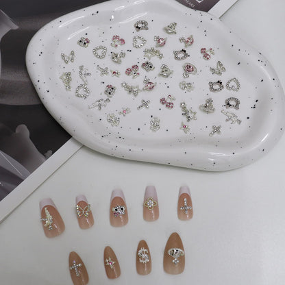50Pcs Nail Charms Rhinestones Gems Kitty Heart Star Gun Planet Cross Jewelry for Acrylic Nails Accessories Women Nail Decorations Manicure Craft DIY Nail Art Supplies