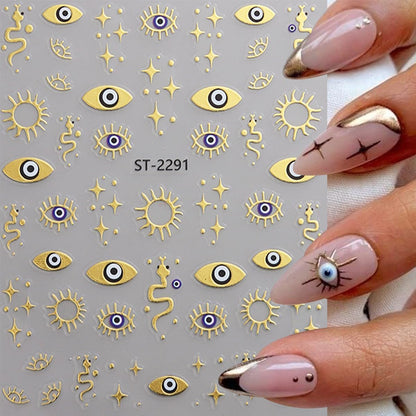 12 Sheets Gold Eye Nails Stickers Decals Star Sun Design Nails Art Stickers 3D Self-Adhesive Snake Moon Nail Art Decals for Women DIY Nail Decorations
