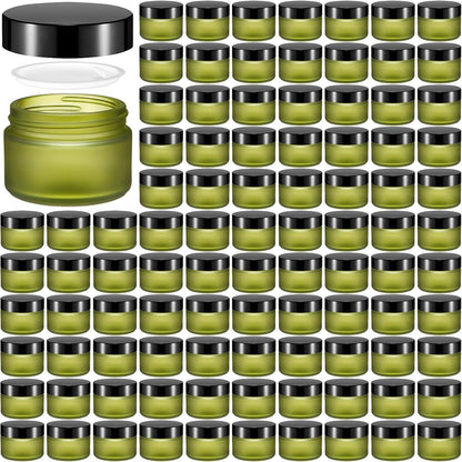 Domensi 100 Pcs 1 oz Glass Jars with Lids Bulk Round Glass Cosmetic Jars Lids 1 oz Small Travel Containers with Inner Liner for Lotions Powders Ointments Sample Cream(Bean Green,Black)